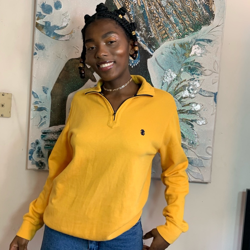 Mustard yellow sweater with blue elbow patches